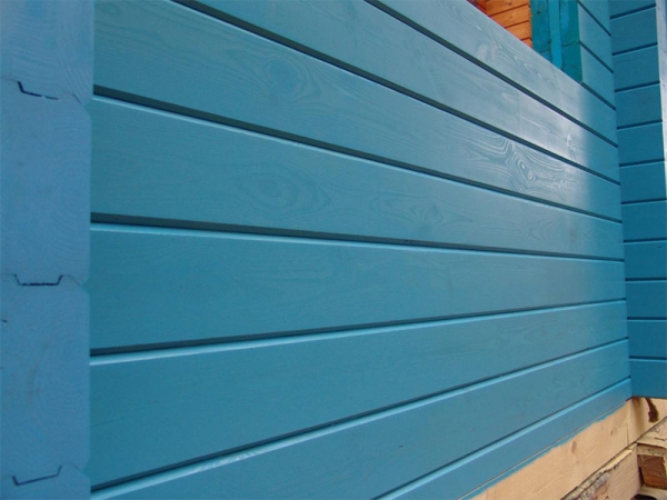 Якою фарбою пофарбувати дерев'яний будинок