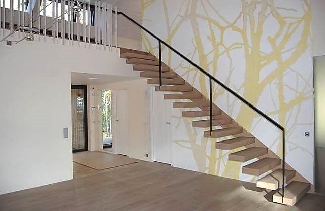Виды и варианты дизайна лестниц на второй этаж для частного дома